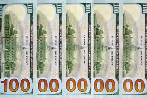Hundred dollar bills arranged such that they show "10,000,000"