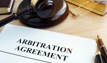 A gavel and an arbitration agreement