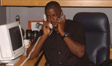 Joe Dumars listen to two phones at the same time