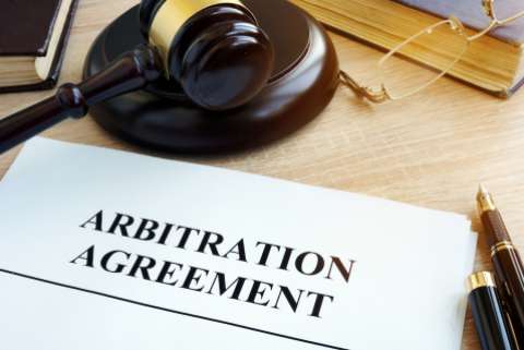 A gavel and an arbitration agreement