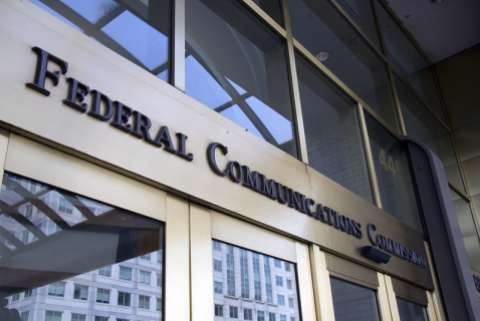 The sign over the door at the entrance to the FCC headquarters