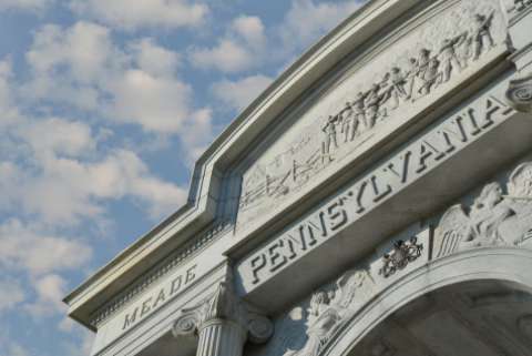 A frieze and the words "MEADE" and "PENNSYLVANIA" above the entrance to a building