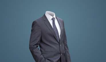 a headless man in a business suit