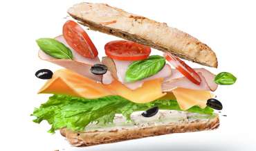 A floating submarine sandwich separates into its constituent parts